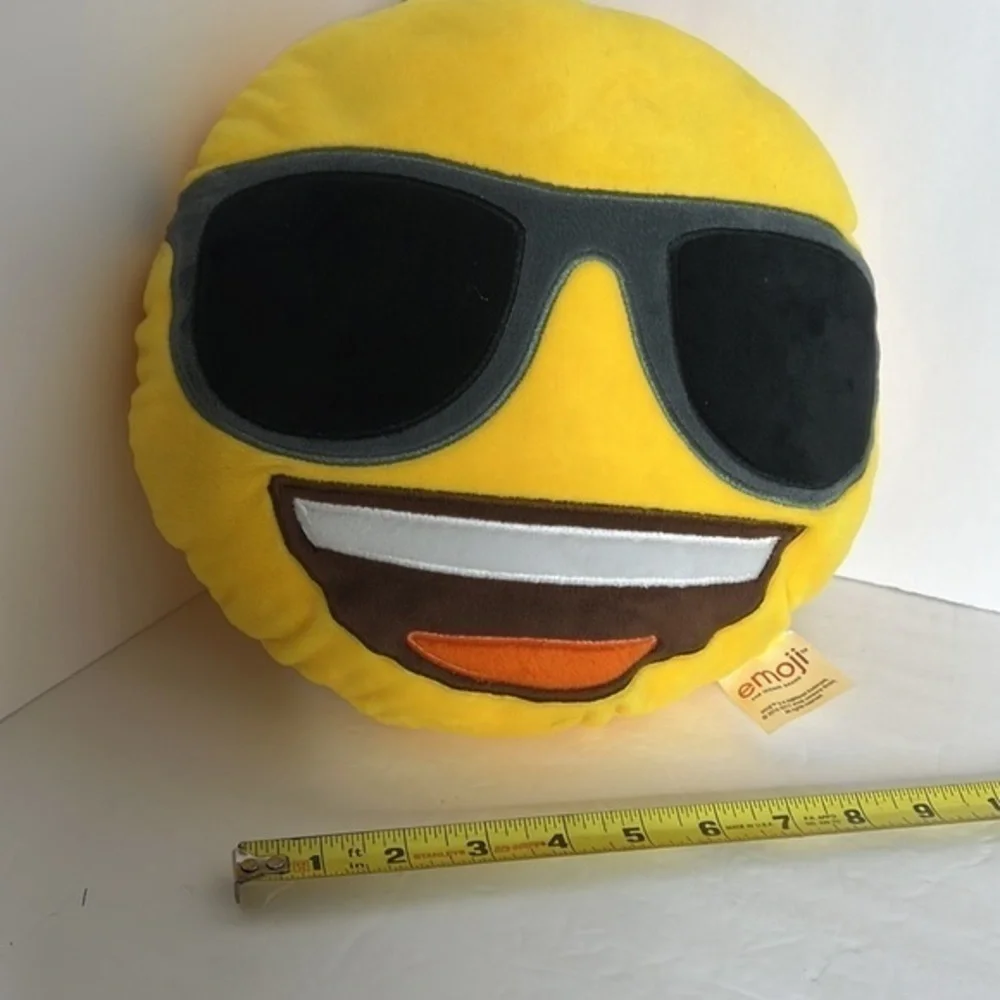 THE ICONIC BRAND EMOJI SMILE PILLOW WITH SUNGLASSES
